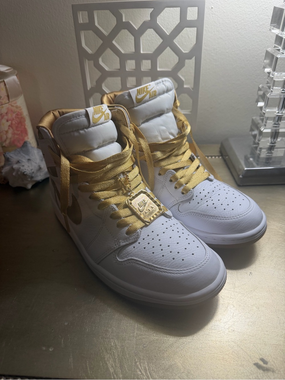 Nike High-Top Air Jordans in White and Gold